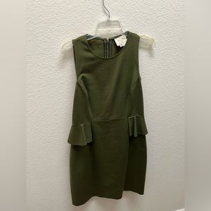 Kate Spade dress. Peplum on the hips with exposed gold zipper in the back